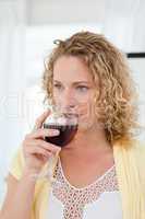 Pretty woman drinking some wine