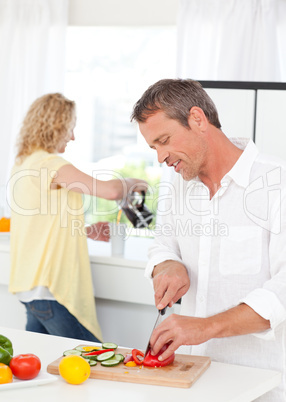 Couple cooking together in their kitchen