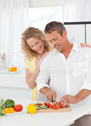 Couple cooking together in their kitchen