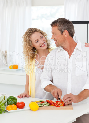 Couple cooking together in their kitchen