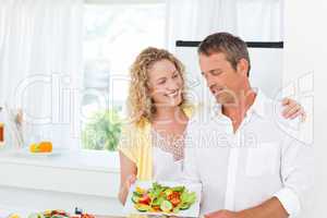 Couple cooking together in their kitchen