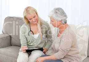 Doctor talking with her patient