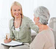 Doctor talking with her patient