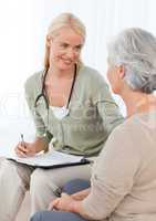 Doctor talking with her patient