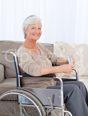 Woman looking at the camera in her wheelchair