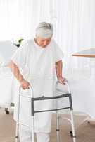 Senior woman with her zimmer frame