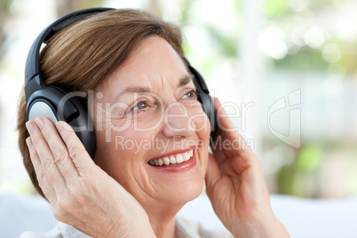 Senior listening to music