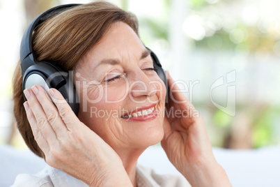 Senior listening to music