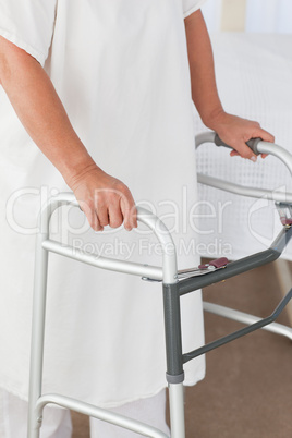 Senior woman with her zimmer frame