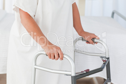 Senior woman with her zimmer frame