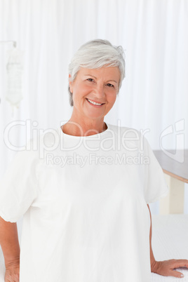 Happy woman  looking at the camera in a hospital