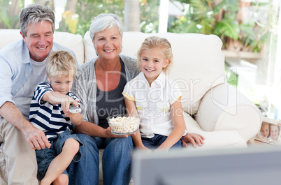 Lovely family watching tv