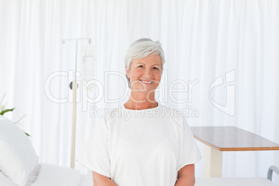 Happy woman  looking at the camera in a hospital