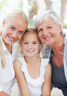 Portrait of a joyful family looking at the camera