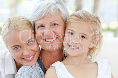 Portrait of a joyful family looking at the camera