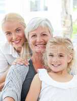 Portrait of a joyful family looking at the camera