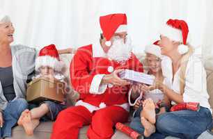 Santa Claus with a happy family