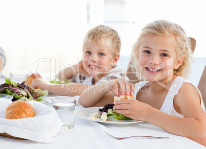 Happy children at the table