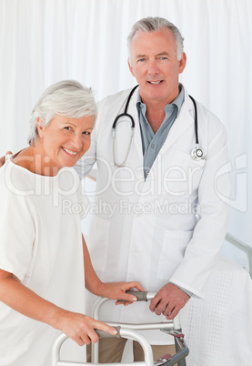 Patient with her doctor looking at the camera