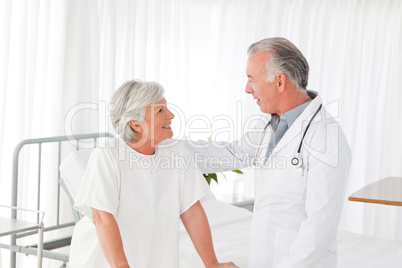 Doctor speaking with his patient