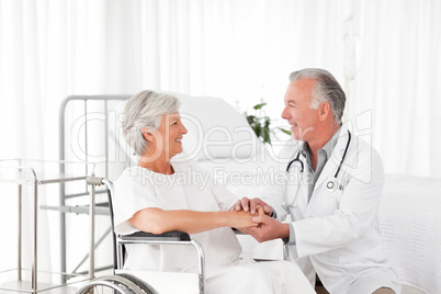 Doctor speaking with his patient