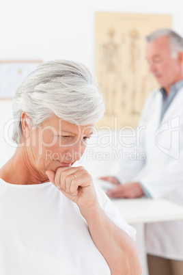 Sick patient with her doctor