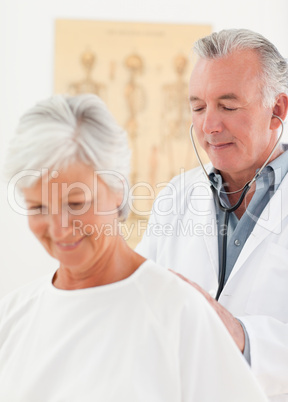 Doctor examining his patient