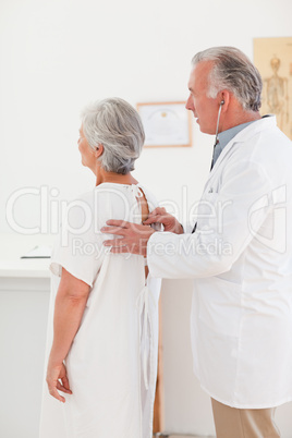 Doctor examining his patient