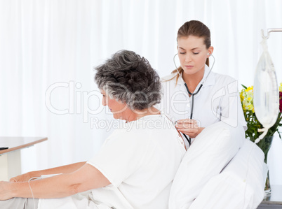 Nurse taking care of her patient