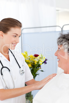 Mature woman talking with her nurse