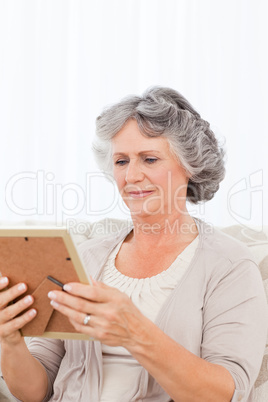 Woman looking at a photo