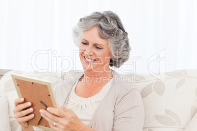 Woman looking at a photo