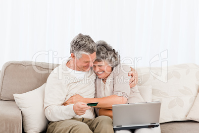 Seniors buying something on internet