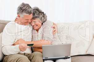 Seniors buying something on internet