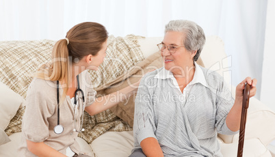 Nurse talking with her patient