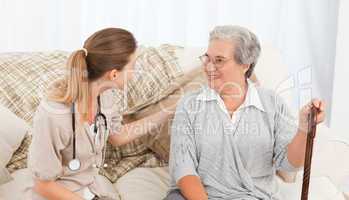 Nurse talking with her patient