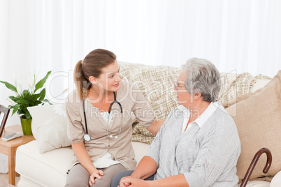 Nurse talking with her patient