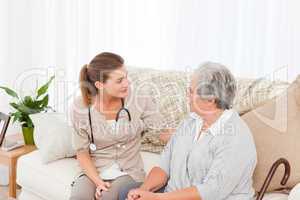 Nurse talking with her patient