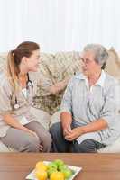 Nurse talking with her patient