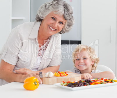 Boy and his grandmother looking at the camera