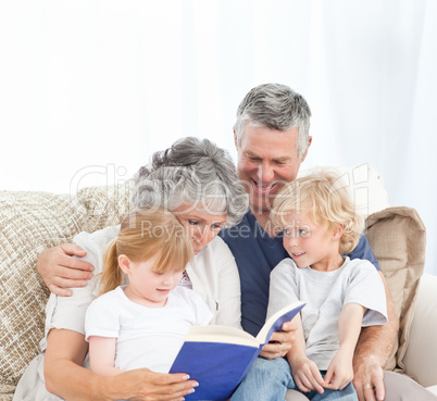 Family looking at a photo album