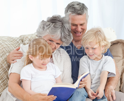 Family looking at a photo album