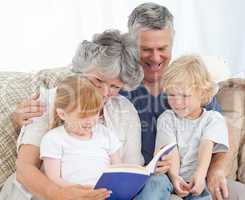 Family looking at a photo album