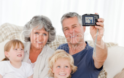 Family taking a photo of themselves