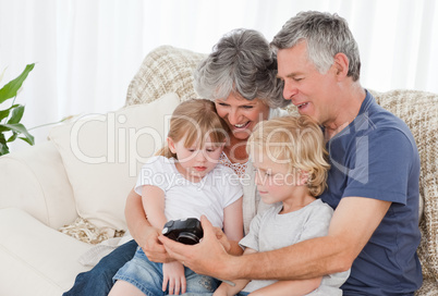 Family looking at their camera