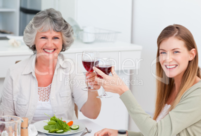 Woman drinking with her mother