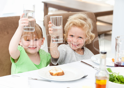 Children toasting with their drink