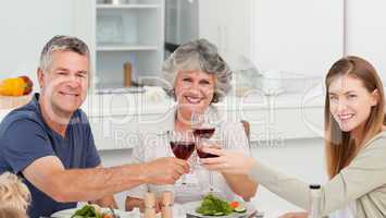 Family drinking wine together