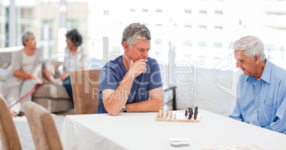 Seniors playing chess