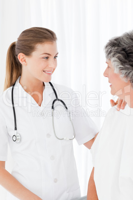 Patient with her nurse smiling